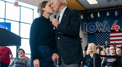 Biden kissing granddaughter on the lips