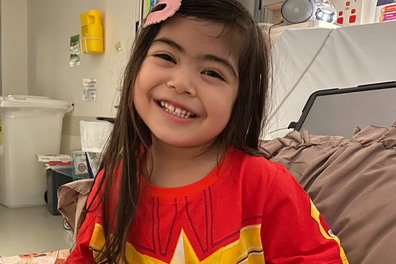 Inayah in her Supertee shirt during a hospital visit.