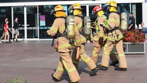 Fire and Rescue officers were called in to inspect the bank while staff members were treated on the scene and people nearby were told to avoid the area. Picture: AAP.