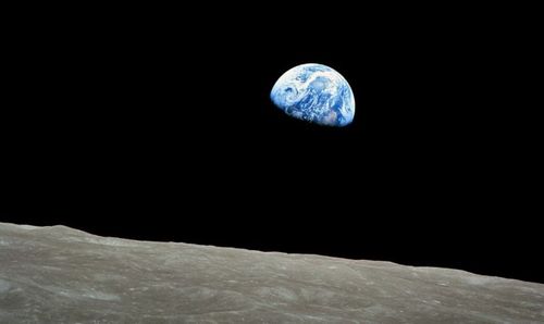 A handout picture released by NASA on 25 December 2013 shows a view of planet Earth seen from the Moon, at space, 24 December 1968.  (AAP)