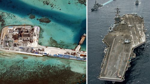 The USS Carl Vinson strike group is expected to sail close to disputed artificial reefs built by China. (AP).