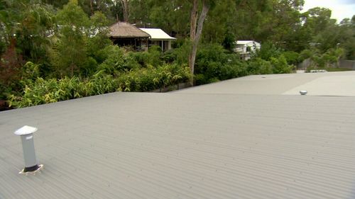 The Hunters have repainted the roof twice in an effort to stop the glare.