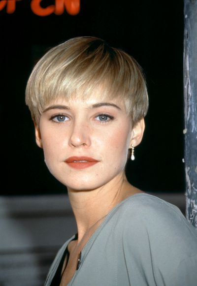 <p>The sweetest girl to reside on <em>Melrose Place</em>, Jane Mancini, played by actress Josie Bissett was the perfect example of cool '90s minimalism in 1992 with her sleek, platinum blonde pixie cut.</p>
<p> </p>
<p> </p>