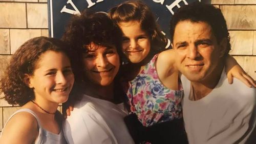 Larry Kelly pictured with his wife Dawn and two daughters — Jackie and Jessica. Before being put into a coma, Larry promised his wife he'd 'keep fighting'. 