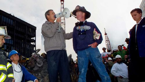 President George W Bush rallies the crowd at the base of the World Trade Centre on September 14, 2001.