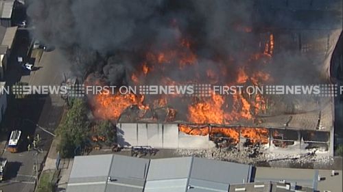 More than 300 people have been evacuated from the complex and surrounding businesses. (9NEWS)
