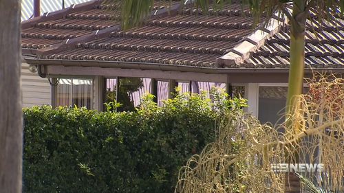 A woman known to Mr Gordon suffered facial injuries at a Carina Heights home. (9NEWS)