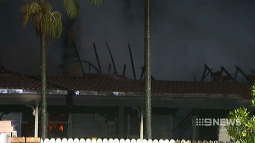 Neighbours said flames were up to three metres tall. (9NEWS)