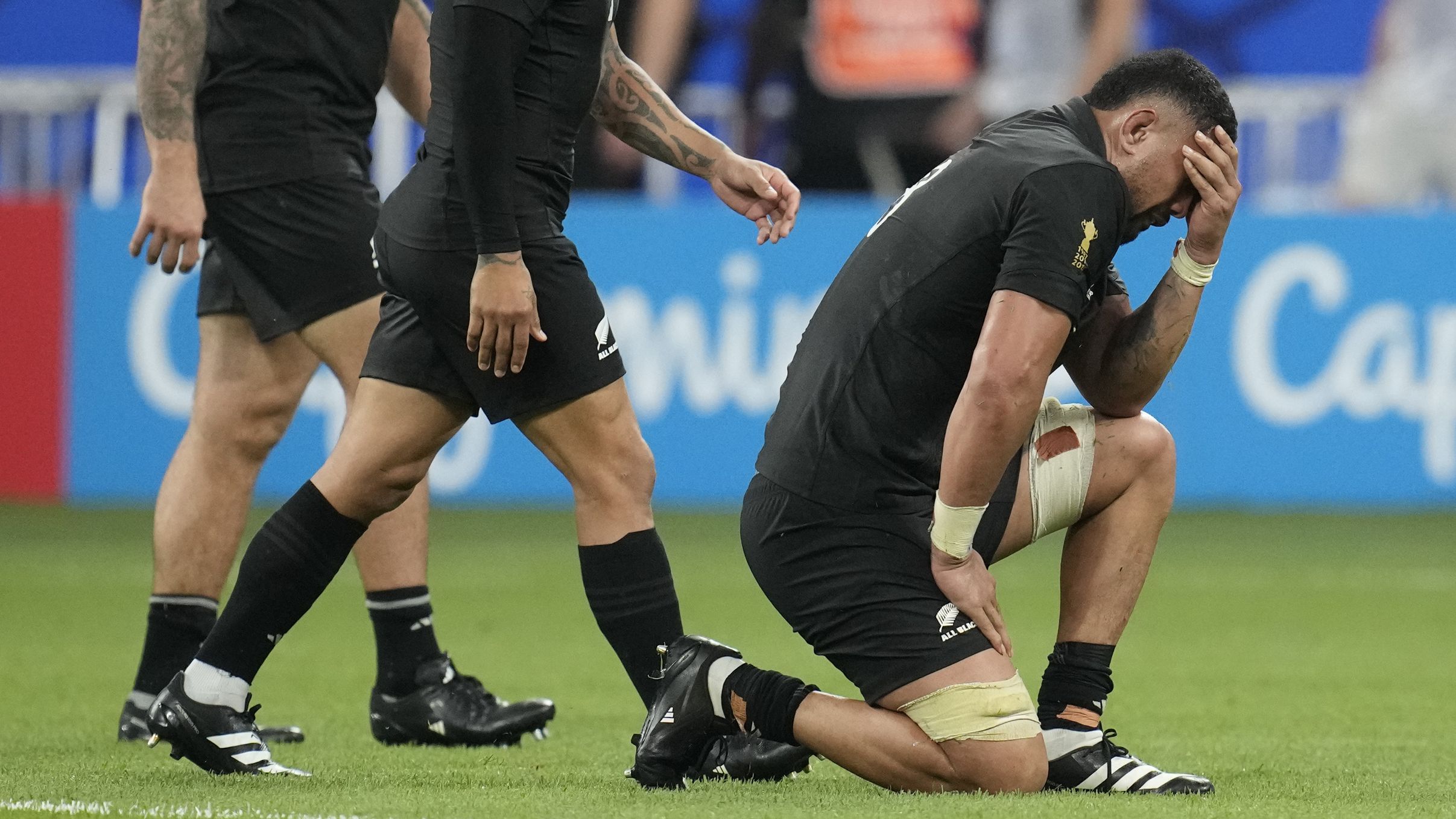New Zealand&#x27;s Ardie Savea drops  to his knees after the All Blacks lost to France.