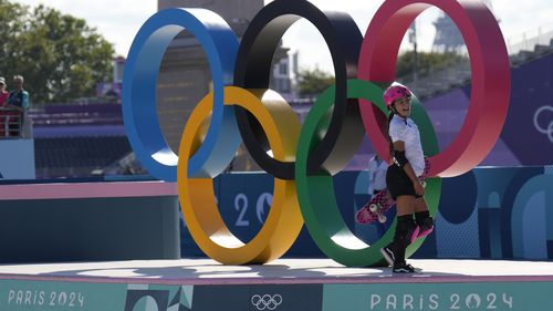 Arisa Trew of Australia reacts at the end of her run during the women's skateboarding park final 