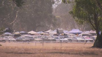 A man in his 20s is believed to have died and several others have been rushed to hospital after suspected drug overdoses at two Victorian music festivals while state sweltered in record heat.