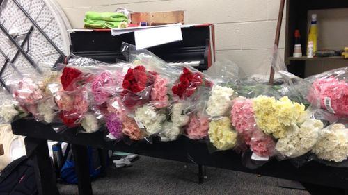 Hayden had to save for a year-and-a-half to pay for the 900 flowers. (Facebook)