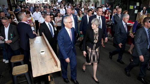 The pair visits stall holders at Borough Markets and thanks first responders. (AAP)