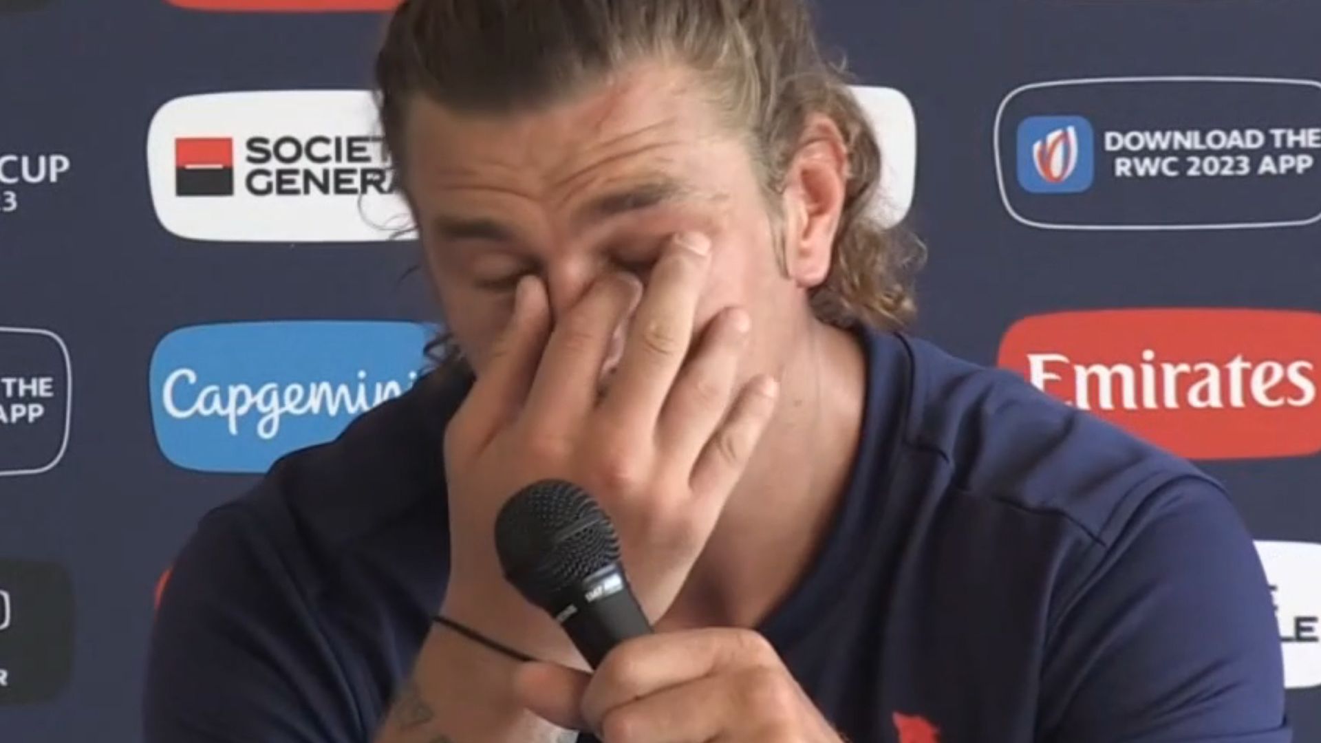 Bastien Chalureau wipes away tears upon being asked about racism allegations against him.