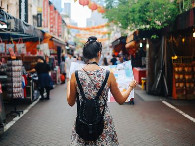 Young woman travelling in Singapore