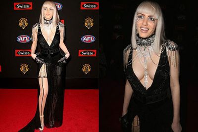 From the Freddie Kruger-inspired gloves to the gothic Barbie get-up (complete with naughty neckline), Gabi Grecko blends into the 2014 Brownlow crowd.<br/><br/>Just kidding, she totally sticks out like a sore (but controversial) thumb.