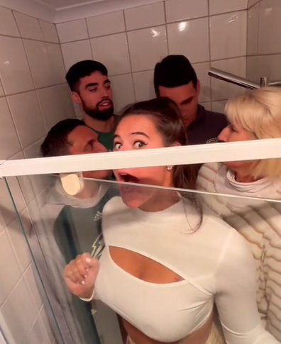 Tall family struggles to fit into shower