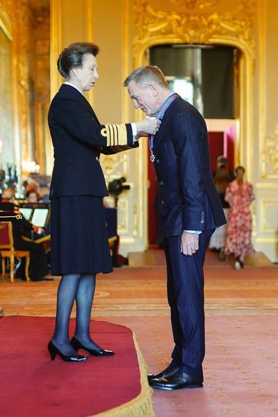 Princess Anne awards Daniel Craig, October 2022