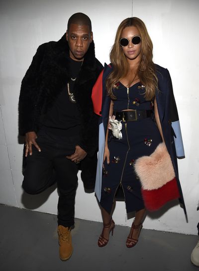 Jay-Z and Beyonce in a cropped top and pencil skirt by luxury designer Charles Harbison at the Adidas Originals x Kanye West Yeezy Season 1 Show in New York City 2015