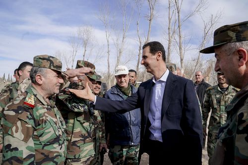 In a rare visit to a conflict zone, Assad met with Syrian armed forces. (AAP)