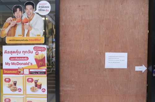 A sign on the door of a McDonald's after earlier problems in the fast food restaurant, in Bangkok, Friday, March 15, 2024.  