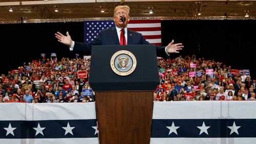 US President Donald Trump speaks during a rally at the IX Centre, in Cleveland.