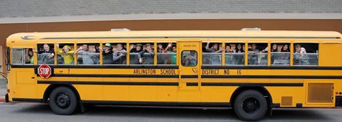 The students gave the grandmother a poster of them all waving from the bus. (Facebook)