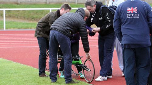 Prince Harry comes to the rescue when athlete is knocked from her wheelchair