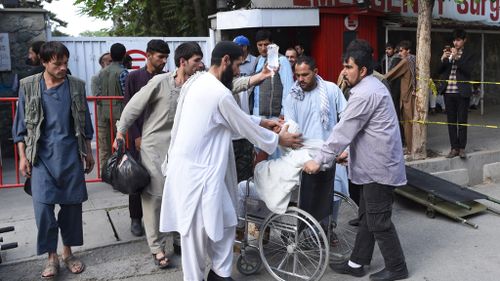 Blasts at Afghan funeral kills at least 12