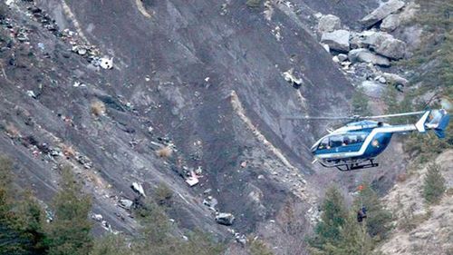 The crash site is spread over a large area in the French Alps near the southern town of Toulons. (AAP)