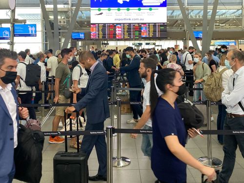 This photograph, taken last week, shows how busy the domestic terminal at Sydney airport is already getting.