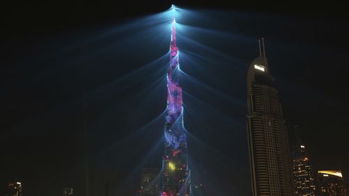 The world's largest tower was lit up with LED lights in Dubai. (AAP)