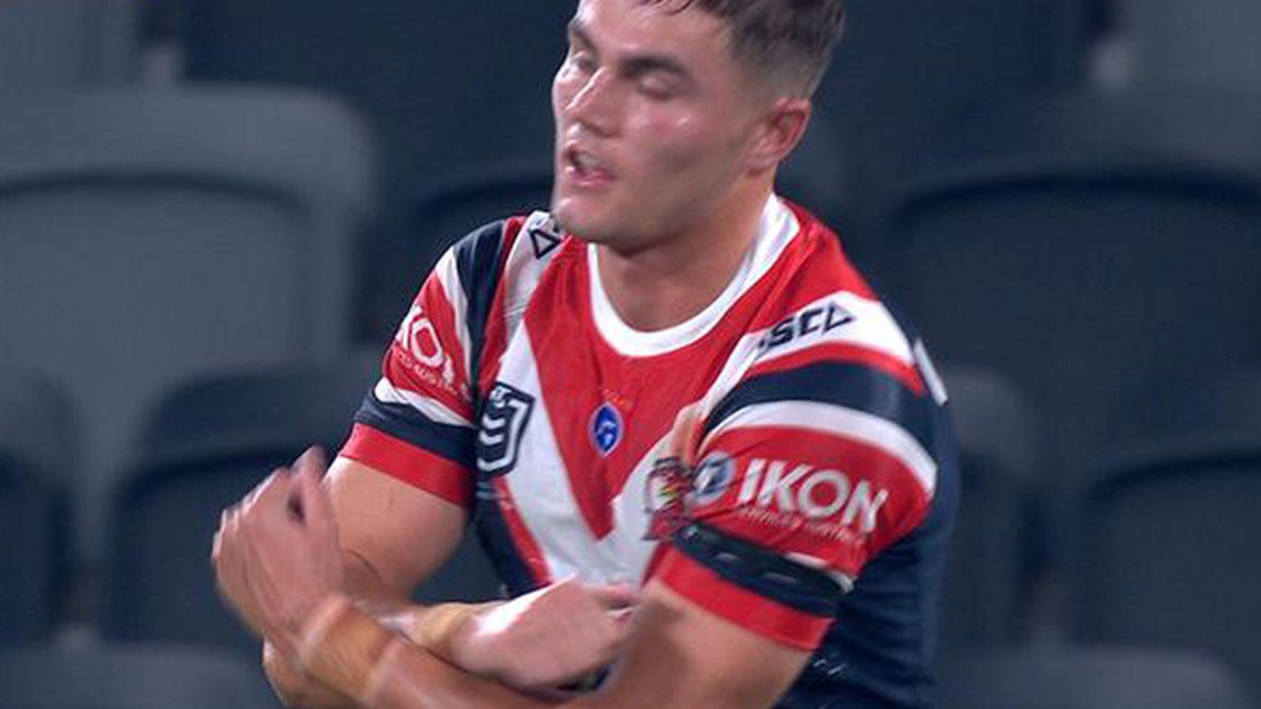 Sydney Roosters halfback Kyle Flanagan appears to pay tribute to former teammate Bronson Xerri 