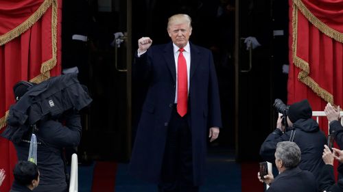 Donald Trump arrives on the podium at the US Capitol. (AAP)