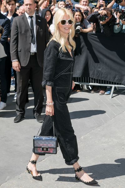 <p>The <a href="http://style.nine.com.au/2017/06/01/12/27/sistine-stallone-chanel-tokyo-lily-depp" target="_blank">Chanel</a> show in Paris on Tuesday drew the haute couture
and Hollywood A-list but it was Claudia Schiffer, 46, in a denim jumpsuit that
showed the title of ‘supermodel’ doesn’t disappear when you retire from the
runway.</p>
<p>
In white sunglasses the German who rose to fame as a Guess
campaign girl, going on to become one of Karl Lagerfeld’s muses in the ‘90s, was an understated blonde bombshell, standing out from the peroxide pixie crop pack of pop singer Katy Perry, Kristen Stewart and Cara Delevingne.</p>
<p>While there were some adventurous front row outfits, with Kristen dressed in a reflective sleeveless jumpsuit looking as though she had stepped of the Studio 54 dancefloor, Karl kept things understated in his runway tribute to the Eiffel Tower.</p>
<p>See the battle of the blondes and other shades of success here.</p>
<p>&nbsp;</p>