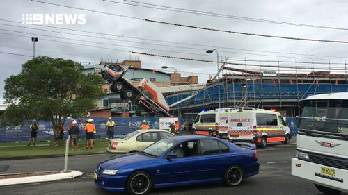 The crane collapsed into a construction site at Taree Hospital. (9NEWS)