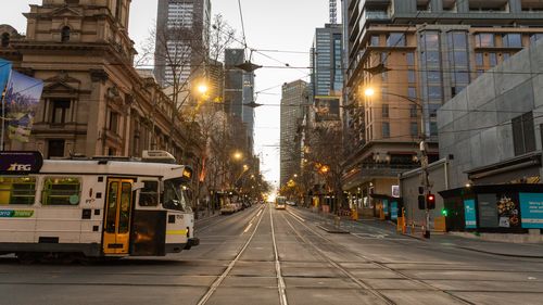 Trams operating on a quiet intersection in the Melbourne Central business district 