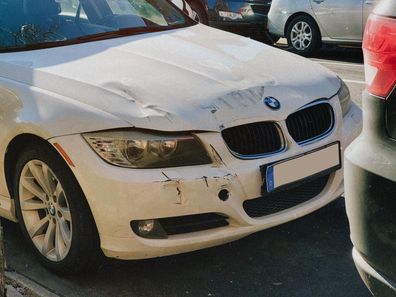 Stock photo of a damaged car.
