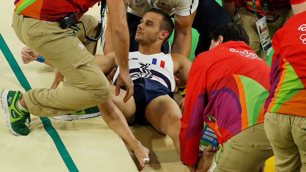 Amir Ait Said could only cover his eyes before medics and officials rushed to his aid. (Getty)