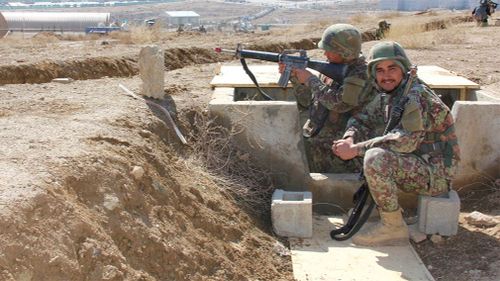 Afghan soldiers during a training drill. (9NEWS)