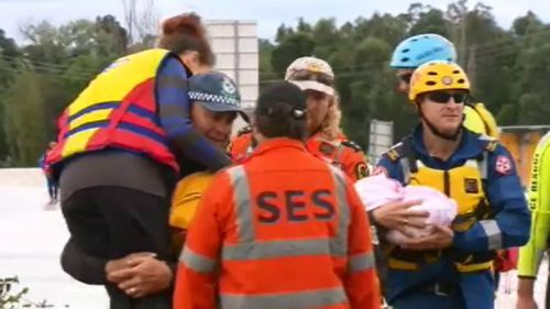 A four-month-old baby was evacuated during a flood rescue operation near Maitland. (9NEWS)