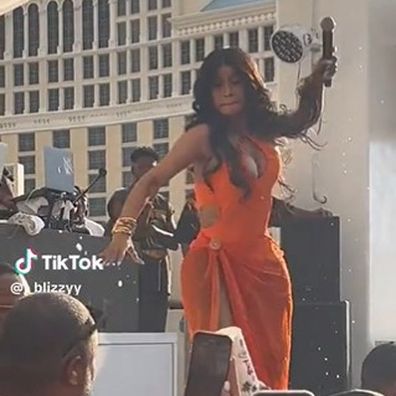 Cardi B throws microphone at fan who threw drink at her mid-performance