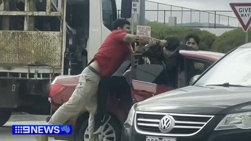 Two truck drivers have fought back after armed men tried to carjack their vehicle from a Melbourne service station carpark.