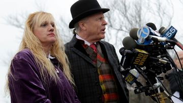 Mari Gilbert, left, with her lawyer John Ray at a news conference in 2011.