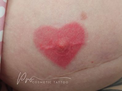 A tattoo of a heart-shaped nipple by Nicole Prance.
