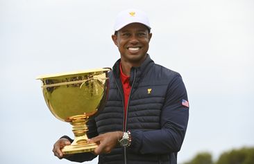 US Team Captain Tiger Woods holds the Presidents Cup trophy during the final round singles matches at the Presidents Cup at The Royal Melbourne Golf Club on December 15, 2019, in Victoria , Australia. (Photo by Ben Jared/PGA TOUR via Getty Images)