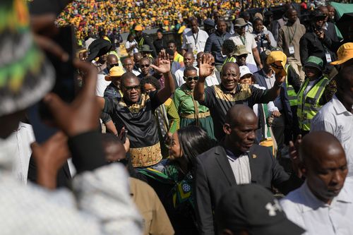 South African President Cyril Ramaphosa greets African National Congress supporters at the Siyanqoba rally at FNB stadium in Johannesburg, South Africa, Saturday, May 25, 2024. 