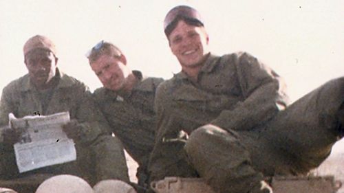 Wade Baker (right) in 1991 serving in Iraq during Operation Desert Storm. (AAP)