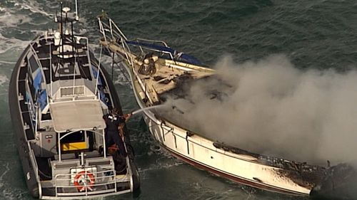News Queensland yacht fire Moreton Island Brisbane news Australia