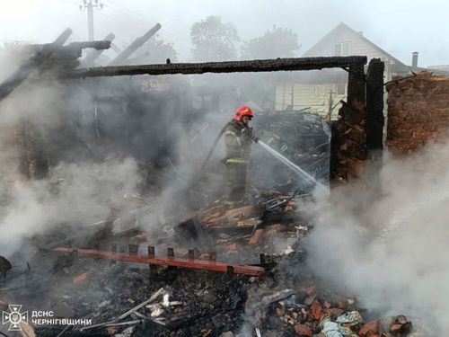 In this photo provided by the Ukrainian Emergency Service, firefighters put out the fire following Russia's drone attack in the Pryluky, Chernihiv region, Ukraine, Thursday, June 5, 2025. (Ukrainian Emergency Service via AP)